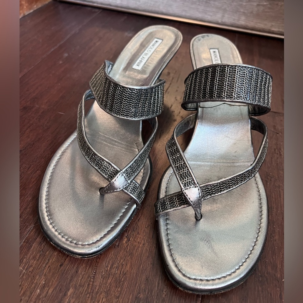 Manolo Blahnik Susa Sandals. Sliver in color with textured straps. 10/42